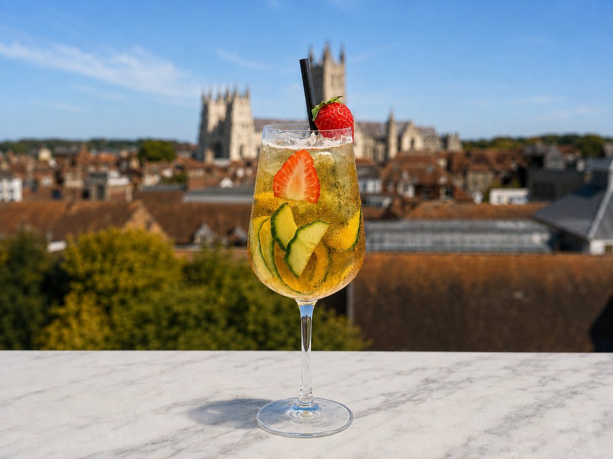 A fruit spritz on the terrace wall with Canterbury Cathedral behind